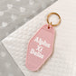 Alpha Xi Delta Motel Hotel Key Chain in Soft pink with white letters and gold ring. AXiD AXD