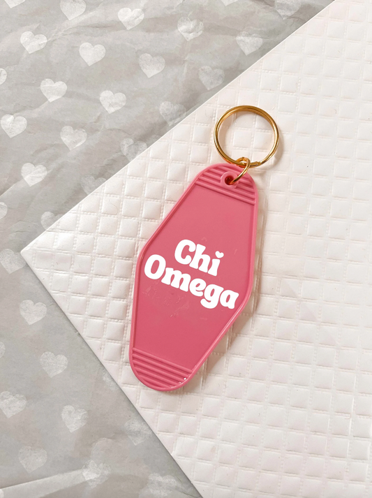 Chi Omega Motel Hotel Key Chain in Hot pink with white letters and gold ring. XO ChiO
