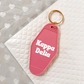 Kappa Delta Motel Hotel Key Chain in Hot pink with white letters and gold ring. KD