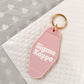 Sigma Kappa Motel Hotel Key Chain in Soft pink with white letters and gold ring. SK