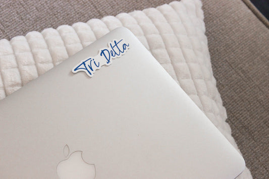 Delta Delta Delta Sticker in Cerulean and handwritten script reading Tri Delta