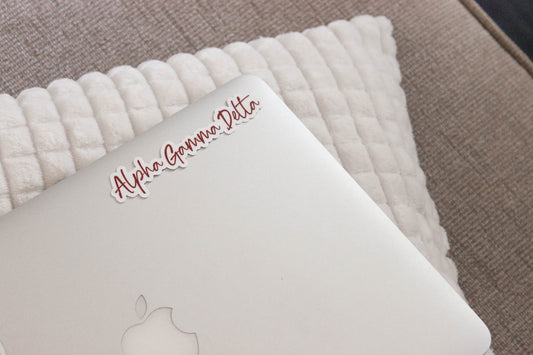 Alpha Gamma Delta Sticker in Alpha Gam Red and handwritten script AGD