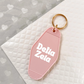 Delta Zeta Motel Hotel Key Chain in Soft pink with white letters and gold ring. DZ