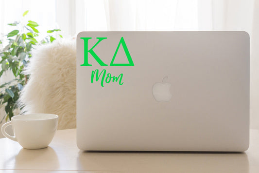 KD Mom in green Kappa Delta 